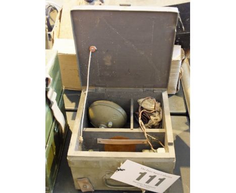 A Canadian lamp aiming unit in a box