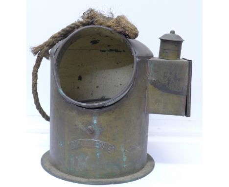 A ship's compass marked The Maritime