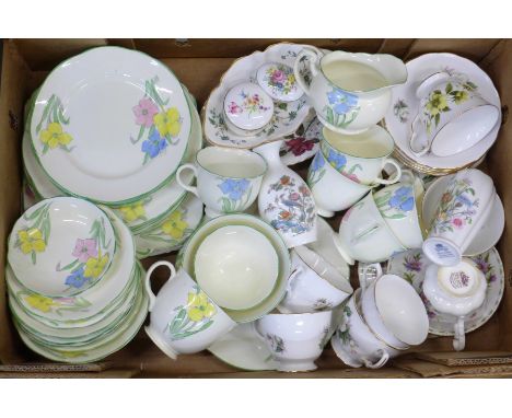A Foley china tea service including cups, saucers, plates, sugar, cream, a Royal Albert Michaelmas Daisy trio, other china in