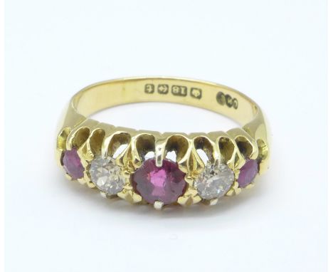 An 18ct gold, ruby and diamond ring, 5.2g, M
