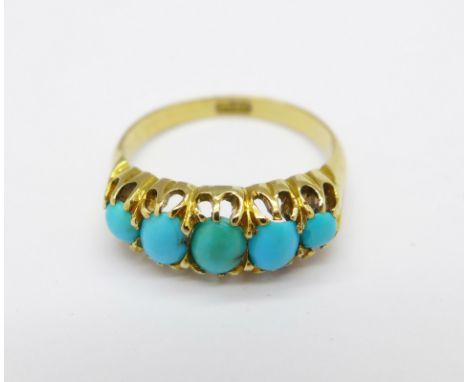 An 18ct gold ring set with five turquoise, 3.2g, K