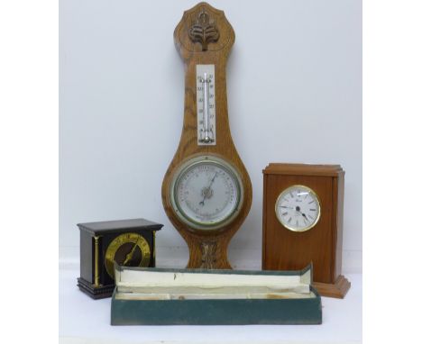 A Hermle quartz clock, a Smiths Tudor Rose clock, a barometer and Nesthill Rubber Ball Re-Inflating Kit, boxed