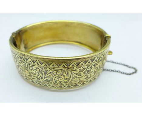 A silver gilt bangle