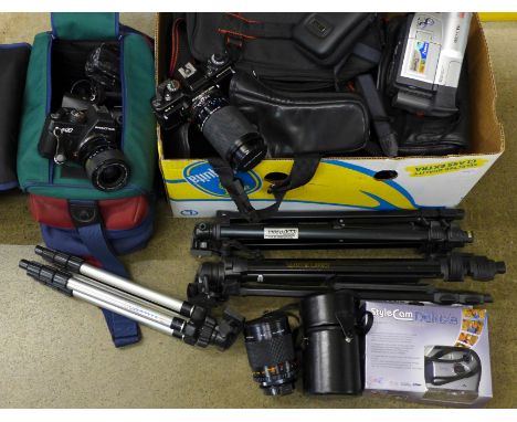 Two Praktica cameras, 13x20 and BC1, a Centon 500mm mirror lens, two camera cases, three tripods, a light meter, flash gun an