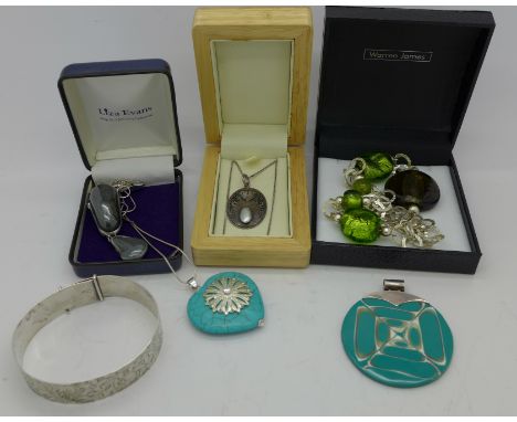 Silver jewellery including a bangle, Art Nouveau style pendant with blister pearl, pendants and chains, etc.
