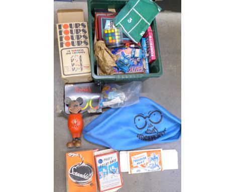 A 1970's space hopper and games including Monopoly, Rubik's Cube, etc.