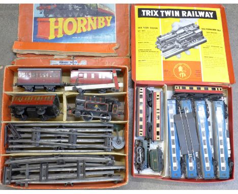 Trix Twin Railway model rail, engine, tender, restaurant car and two other cars, four Tri-ang Pullman carriages, and a Hornby