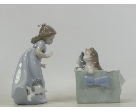 Nao, Two models of a girl with puppy together with a box of kittens (2)