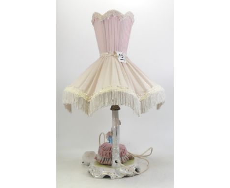 Capodimonte, Figural porcelain lamp. Modelled with a lace porcelain figure of a lady with dog. Height incl. shade: 50cm