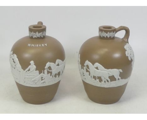 B. P. Co, Pair of Brown Relief Whiskey Hunting Jugs. Height: 18cm (2)