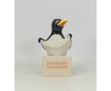 Carltonware, Guinness advertising lamp base 'Draught guiness'. Plaque loose but intact. Height: 17.5cm