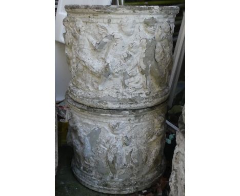 Pair of Large Stone Planter with Putti Designs. Height: 30cm Diameter: 38cm (2)COLLECTION OR COURIER ONLY