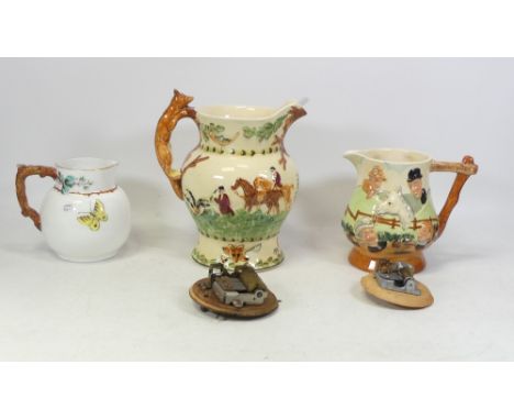 Crown Devon, John Peel Musical Jug together with Lancaster example and Victorian small jug. Height: 20cm (3)