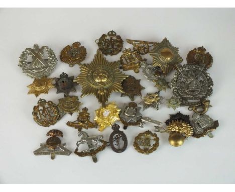 A collection of 30 assorted army badges etc