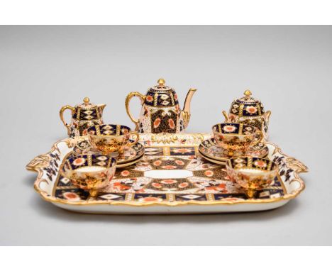 A Davenport imari 'Witches' pattern cabaret setcirca 1870-80the service comprising four teacups, four saucers, cream jug and 