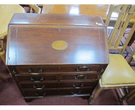 And Edwardian Inlaid Mahogany Bureau, having shell patera to fall front, over one long, two small and two other long drawers,