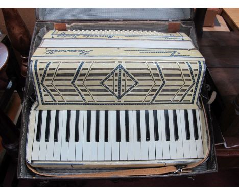 Pancotti, Mecerata Italia Mid XX Century Accordion, with ivorine Marbelette covering, in original carry case.