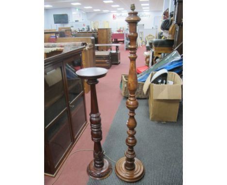 A Turned Hardwood Torchure, 100cm high and a standard lamp. (2)