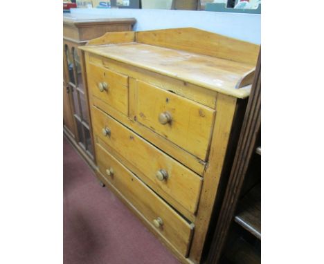 A XIX Century Pine Chest of Drawers, with a 3/4 gallery back, two short drawers, two long drawers, on bracket feet, 107cm wid