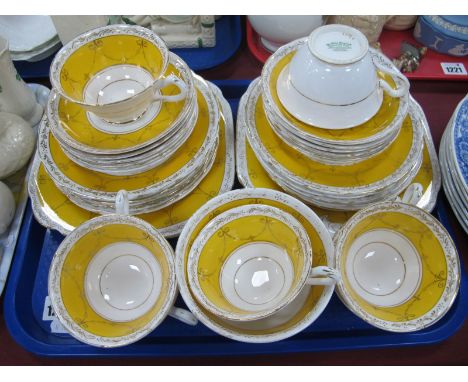 Grosvenor China 'Ye Old English' Tea Service, circa early XX Century, of thirty four pieces with yellow bands and gilt decora