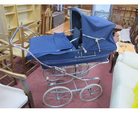 A Vintage Silver Cross Baby's Pram.