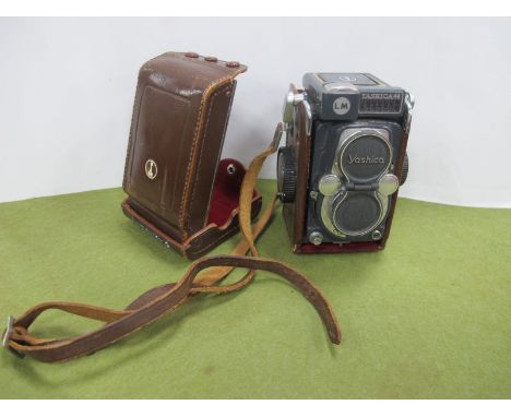 Yashica 44 Camera, with leather casing.