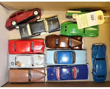 11 Dinky Toys American Cars. Plymouth Estate Car, 2x Ford Fordor/Sedan. Cadillac and a DeSoto Fireflite, Police/RCMP. Plymout