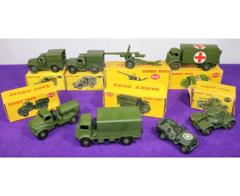 8 Dinky Toys Military Vehicles etc. Army Covered Wagon (623), Military Ambulance (626). 2x Army 1-Ton Cargo Truck (641). Army