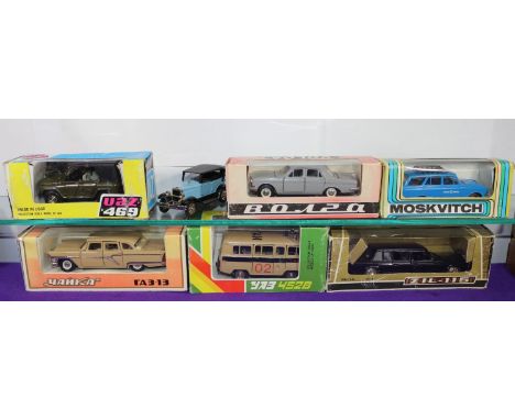 7 Russian made 1:43 scale vehicles. Moskvitch Estate Car in blue. YA3 452B Police Minibus in light brown. UAZ 469 Jeep style 