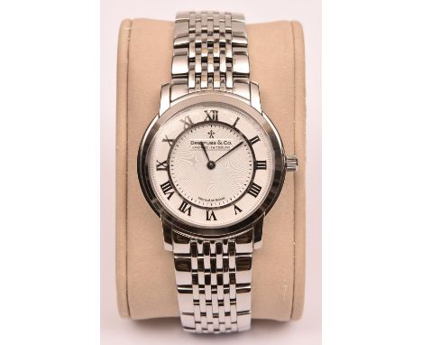 A Dreyfuss & Co. DGB00010/01 Series 1980 watch with quartz movement. Stainless steel case and bracelet with silvered face and