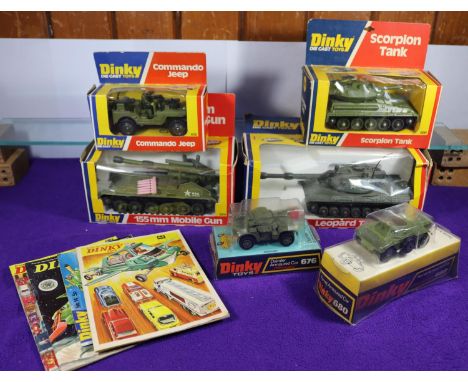 A quantity of Dinky Military. Leopard Tank (692). 155mm Mobile Gun (654). Scorpion Tank (690). Commando Jeep (612). Daimler A