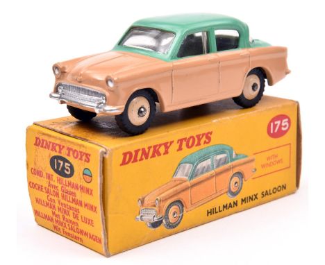 Dinky Toys Hillman Minx Saloon (175). In light green and light brown with beige wheels. black treaded tyres. Boxed, minor wea