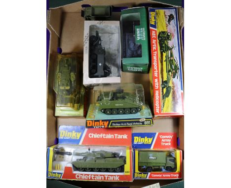 A quantity of Dinky Toys Military. 5 boxed - Chieftain Tank (683). AEC Artic Transporter with Helicopter (618). Leopard Anti-