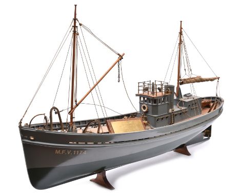 A fine scale model of a 90ft Motor Fishing Vessel, M.F.V.1174. Admiralty designed on Trawler Lines during 1914-18 War as an A