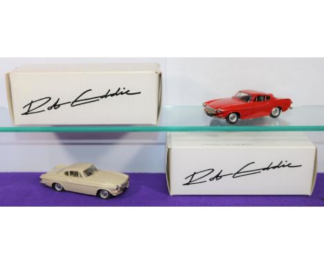2 Rob Eddie white metal Cars. Both Volvo P1800S 1969 (No. 1). One in beige with light brown interior. The other in red with m