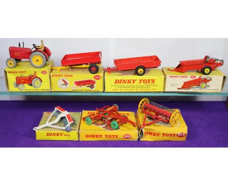 7 Dinky Toys Farm Related Items. A Massey-Harris Tractor (300) in red with metal wheels with yellow centres, complete with dr