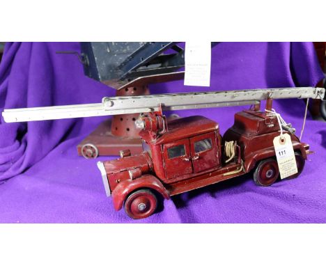 A large Scale Rudimentary 3 Axle Turntable Fire Escape Fire Engine. Vehicle length 36cm, overall length with ladder 52cm, Enc