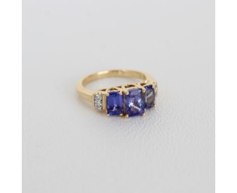 14K Gold &amp; Tanzanite Ring. Hallmarked inside  band.  Ring Size: 5.5 Total Weight: 2.5 dwt  - All silver, gold and/or jewe