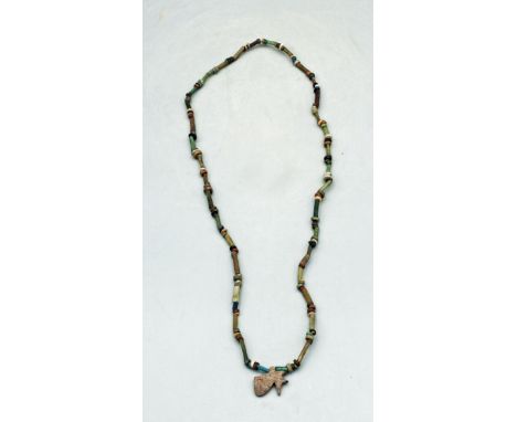 A lovely Egyptian faience bead necklace, Late Period, ca. 664 - 332 BC. It is 20 inches long and is comprised of fine faience