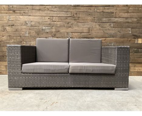 Skyline - two seat rattan garden sofa, with loose cushionsDimensions: Height:&nbsp;73cm&nbsp; Length/Width:&nbsp;171cm&nbsp; 