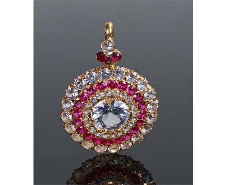 White sapphire and ruby pendant, the central white sapphire at 10mm in diameter with a further sapphire and ruby surround,, 3