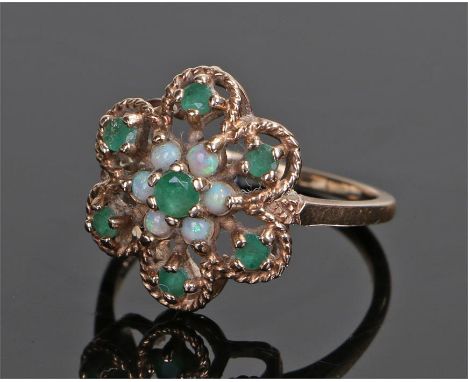 9 carat gold opal and emerald ring, with a flower head design, ring size N