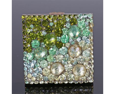 French powder and mirror compact, the lid decorated with glass stones from deep green to yellow. 70mm diameter 