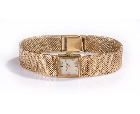 Omega 9 carat gold ladies wristwatch, the signed silvered dial with baton hours, manual wound, 9 carat gold mesh bracelet str