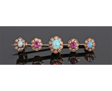 Opal pearl and ruby bar brooch, set in flower heads to the bar brooch, 31mm long