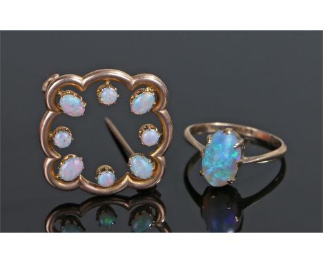 9 carat gold opal jewellery, to include an opal set brooch and an opal ring, (2)