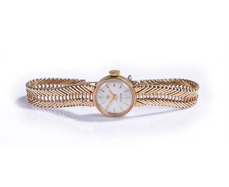Ebel Election 9 carat gold ladies wristwatch, the silvered dial with gilt baton hours, manual wound, with the 9 carat gold br
