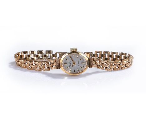 Rotary 9 carat gold ladies wristwatch, the signed silvered dial with baton hours, manual wound, with the 9 carat gold strap, 