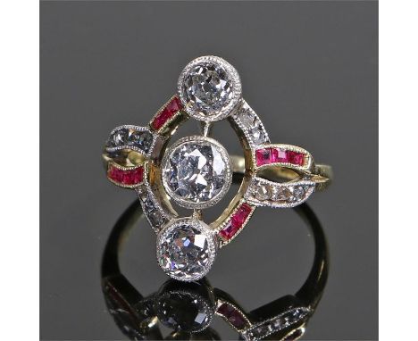 Diamond and ruby ring, with a row of three diamonds to the centre flanked by rubies and further diamonds, ring size M