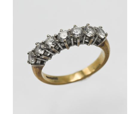 A 9ct gold seven stone diamond dress ring, approx 3.09g, size K.